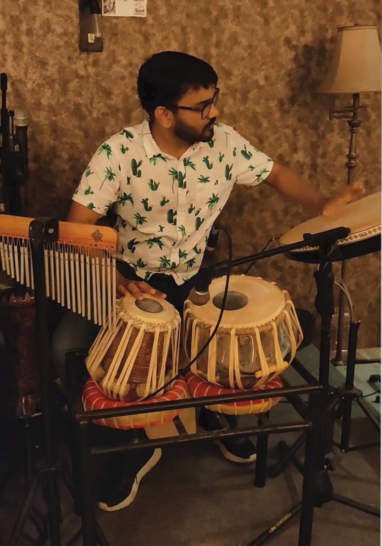 Kartik Sharma playing the tabla